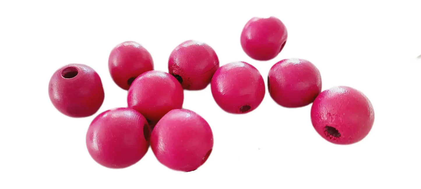 Houten kralen in de kleur fuchsia van decodeb